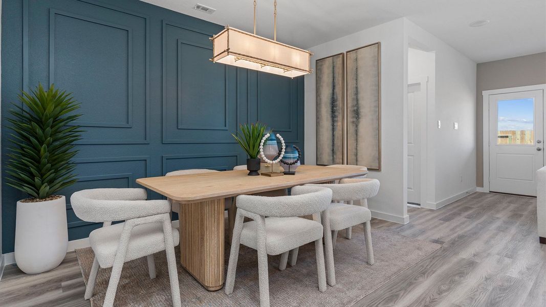 Furnished interior view inside a new home in Caldwell Crossing, Iowa Colony (Image 8).