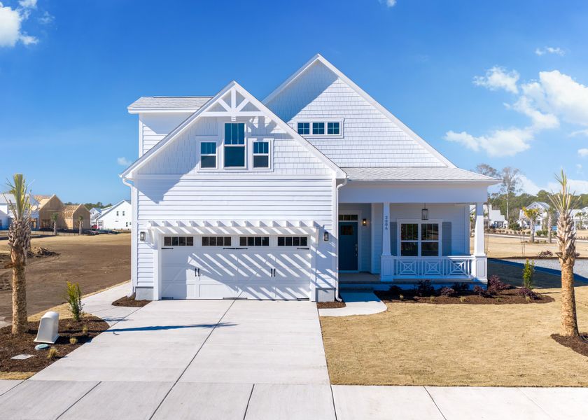 Representative exterior photo of a completed home built from the Beckett by Bill Clark Homes in Sidbury Landing, Wilmington, NC (Image 39). Representative exterior photo of a completed home built from the Beckett by Bill Clark Homes in Sidbury Landing, Wilmington, NC (Image 39).