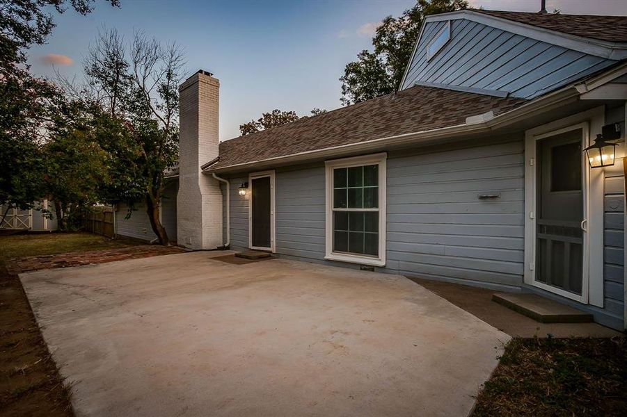 Spacious back porch overlooking large backyard Spacious back porch overlooking large backyard