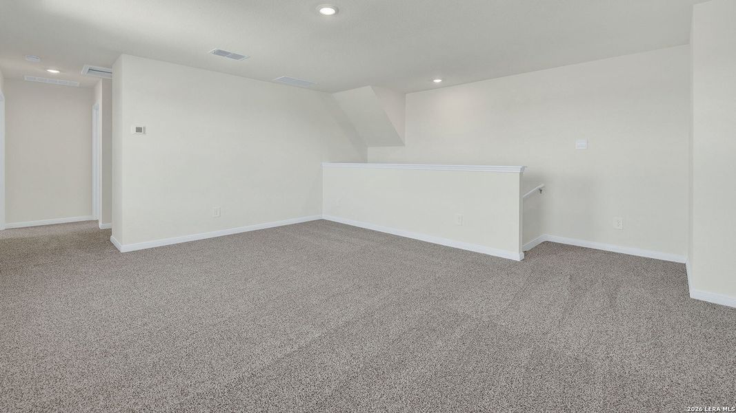 Spacious, unfurnished interior of a new home in Paramount, Kyle (Image 25).