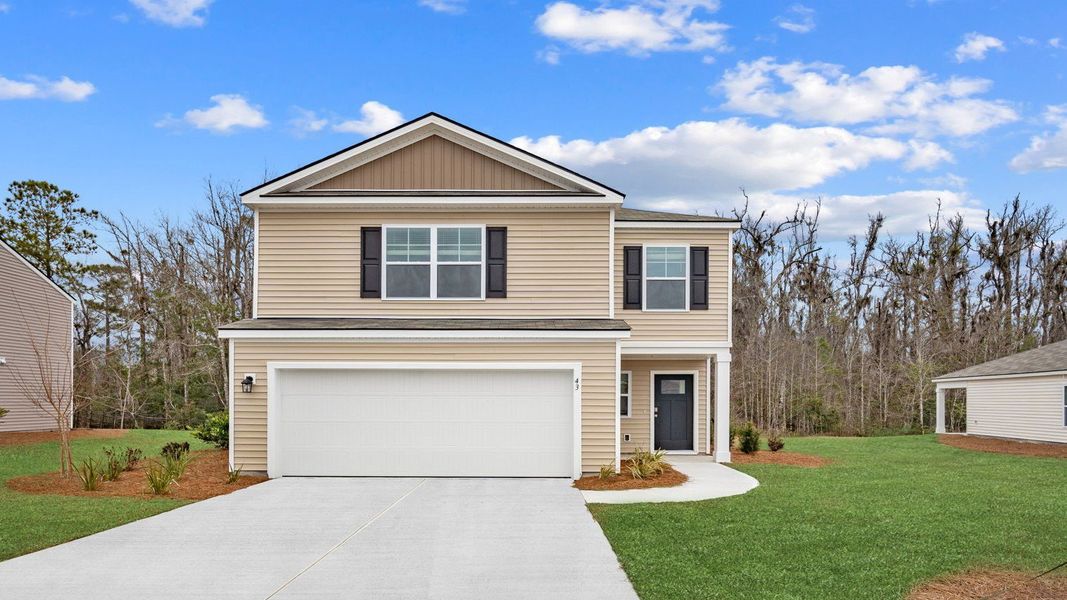 Representative exterior photo of a completed home built from the MANNING by D.R. Horton in Autumn's Wood, Brunswick, GA (Image 2).