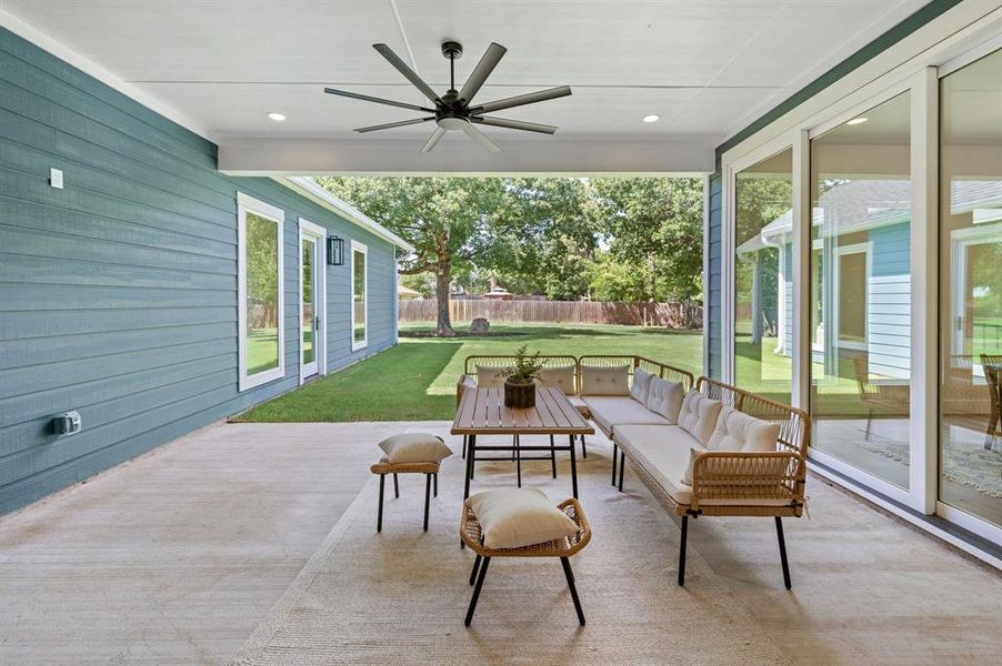 View of patio with an outdoor living space and ceiling fan View of patio with an outdoor living space and ceiling fan