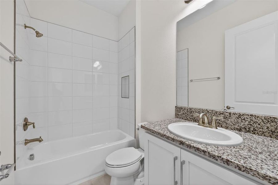 Furnished interior view inside a new home in Winding Ridge, Wesley Chapel (Image 9).