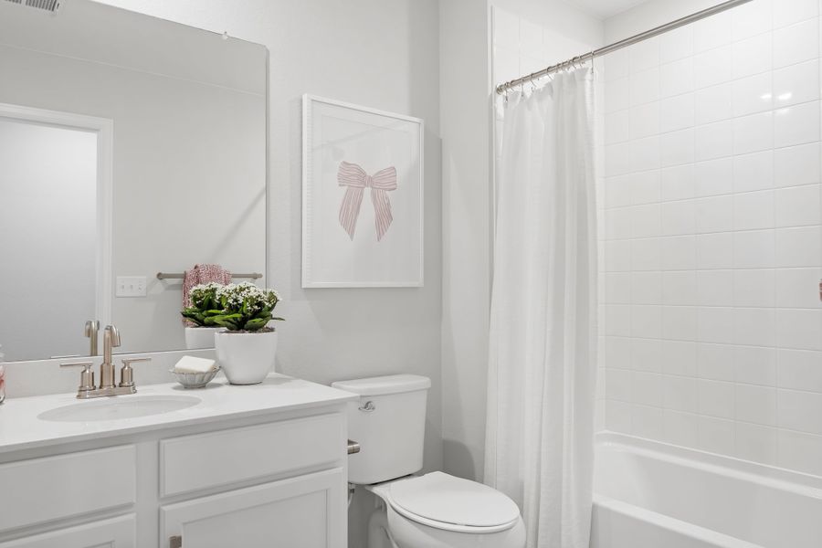 Representative furnished interior of a home built from the 2003 by Risewell Homes in Harvest Crossing, Aurora (Image 16).