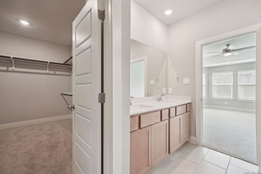 Furnished interior view inside a new home in Estancia Ranch - Classic Series, San Antonio (Image 12).