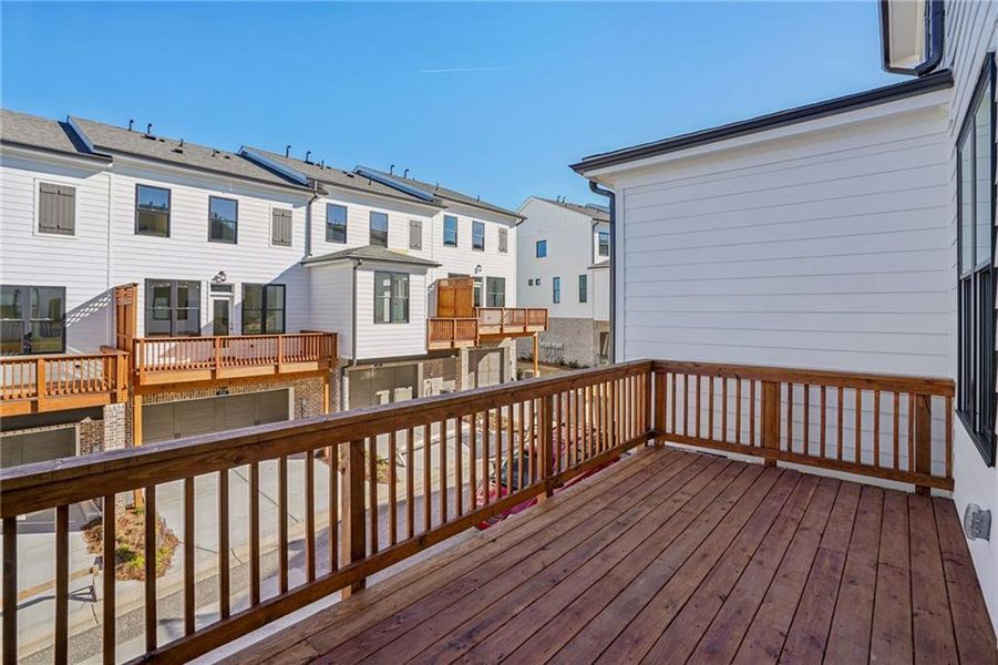 Exterior details and patio area of a home in Palisades Townhomes, Cumming (Image 4).
