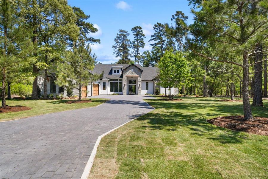 Front exterior of a new home in , Montgomery, TX, highlighting curb appeal (Image 21).