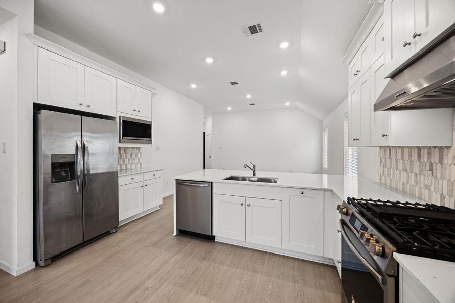 Furnished interior view inside a new home in Sunterra, Katy (Image 6). Furnished interior view inside a new home in Sunterra, Katy (Image 6).
