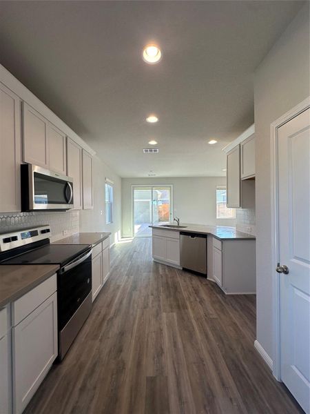 Light & Bright Kitchen with Stainless steel appliances