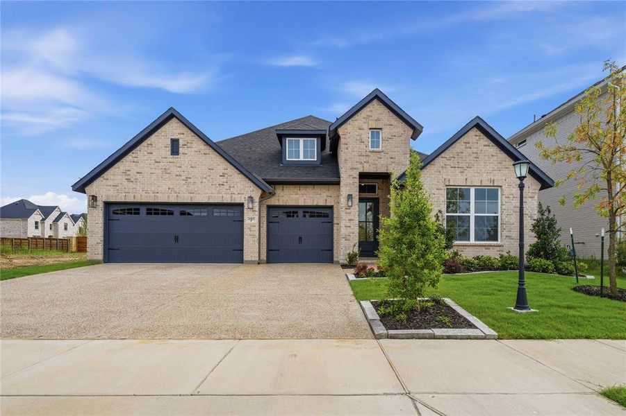 Front exterior of a new home in Solterra Texas, Mesquite, TX, highlighting curb appeal (Image 22). Front exterior of a new home in Solterra Texas, Mesquite, TX, highlighting curb appeal (Image 22).