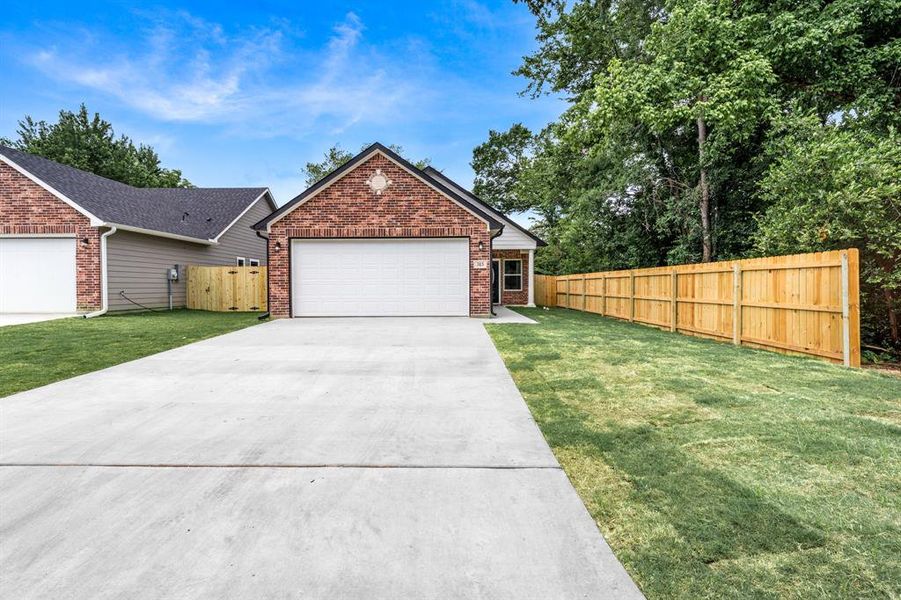 Front exterior of a new home in , Sulphur Springs, TX, highlighting curb appeal (Image 2). Front exterior of a new home in , Sulphur Springs, TX, highlighting curb appeal (Image 2).