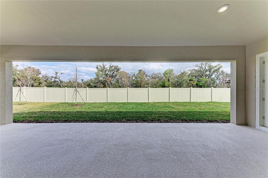 Exterior details and patio area of a home in Crosswind Point, Parrish (Image 22).