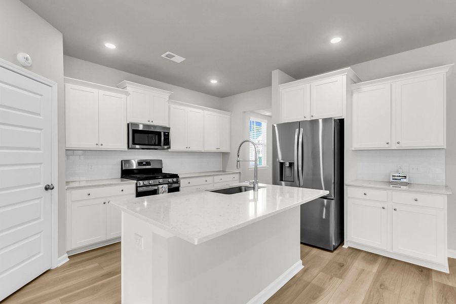Furnished interior view inside a new home in Limehouse Village: Arbor Series, Summerville (Image 12).