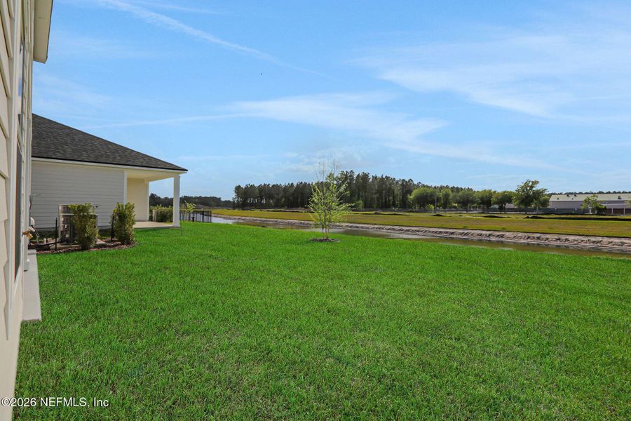Exterior details and patio area of a home in Amberly, Green Cove Springs (Image 4).