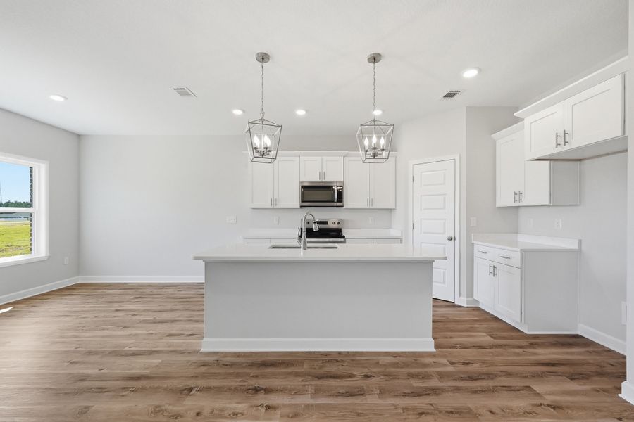 Furnished interior view inside a new home in McCarthy Estates, Defuniak Springs (Image 9).