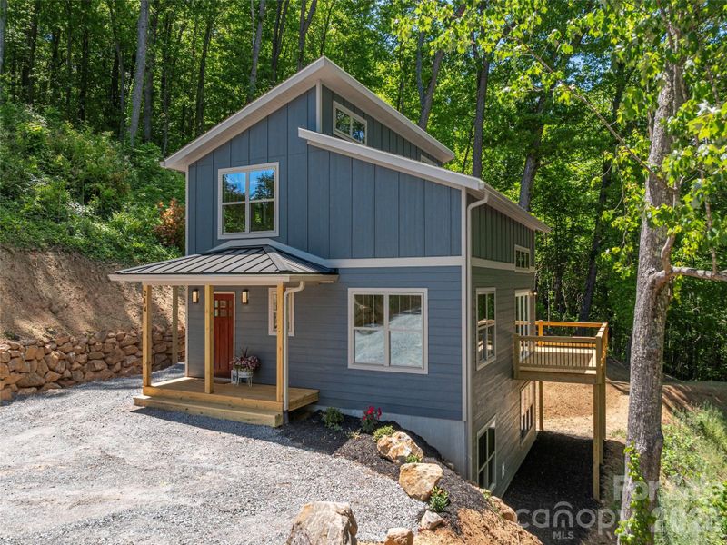 Exterior details and patio area of a home in , Waynesville (Image 23).