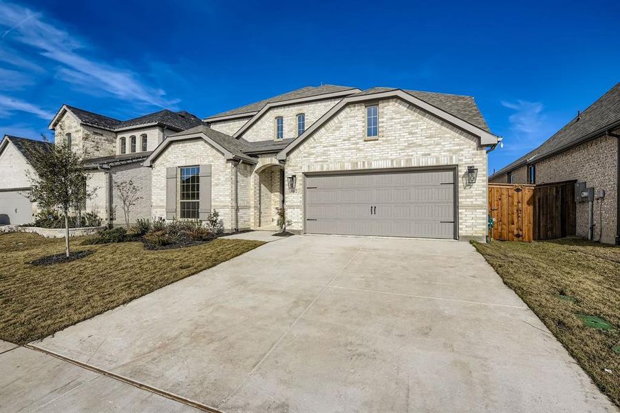 Front exterior of a new home in Wellington 50s, Fort Worth, TX, highlighting curb appeal (Image 2).