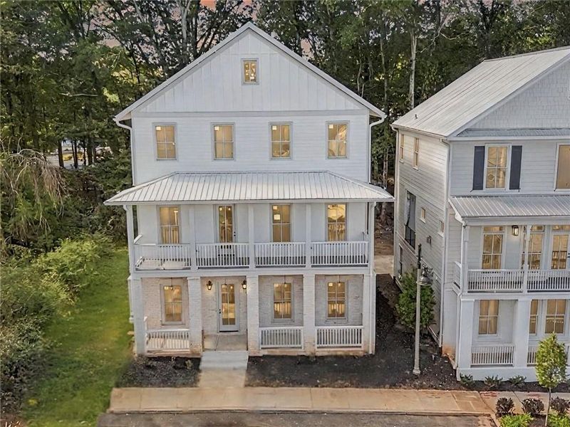 Front exterior of a new home in , Woodstock, GA, highlighting curb appeal (Image 2). Front exterior of a new home in , Woodstock, GA, highlighting curb appeal (Image 2).