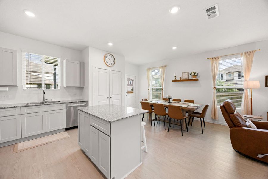 Enjoy gathering around the spacious island, the perfect spot for morning coffee, homework sessions, or serving guests during special occasions.