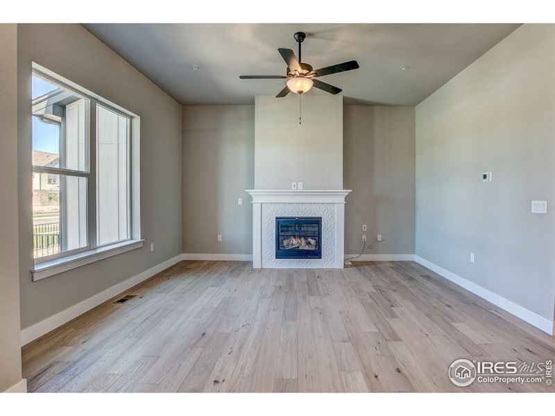 Living Room-  Photos not of the actual unit. Finishes vary.