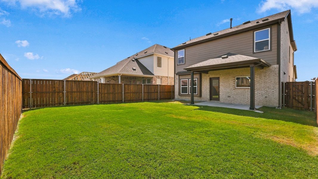 Exterior details and patio area of a home in Westridge Journey, McKinney (Image 22).
