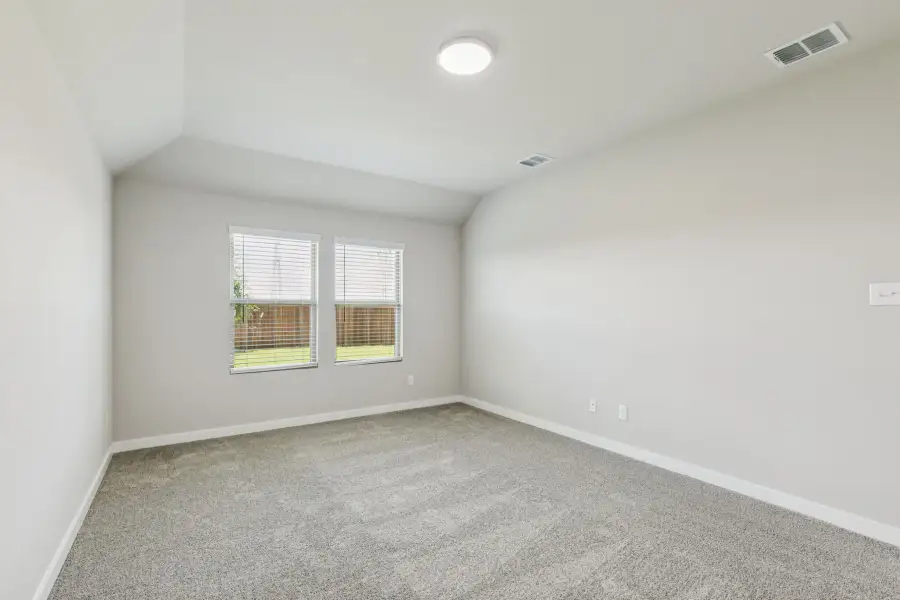 Primary Suite in the Harper home plan by Trophy Signature Homes – REPRESENTATIVE PHOTO