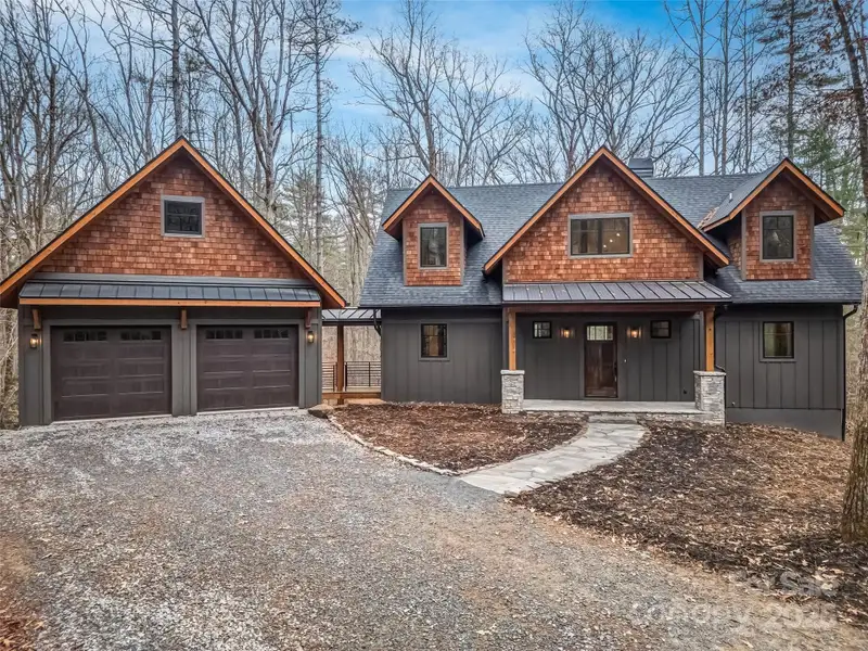 Front exterior of a new home in , Brevard, NC, highlighting curb appeal (Image 1). Front exterior of a new home in , Brevard, NC, highlighting curb appeal (Image 1).