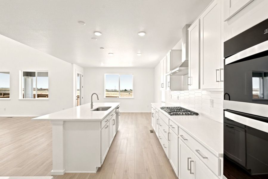 Furnished interior view inside a new home in Cordovan, Firestone (Image 5).