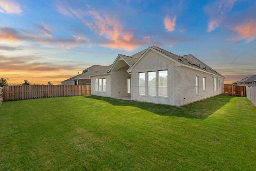 Rear of Home and Private Backyard