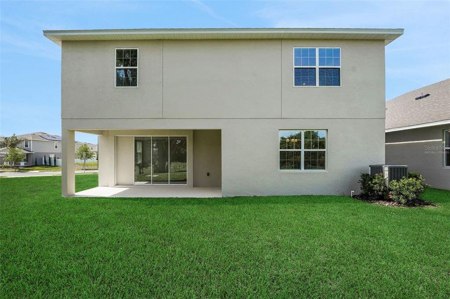 Exterior details and patio area of a home in Avalon Woods, Winter Garden (Image 18). Exterior details and patio area of a home in Avalon Woods, Winter Garden (Image 18).