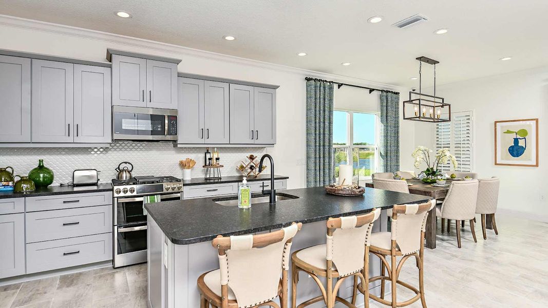 Furnished interior view inside a new home in SkySail Real Estate and Homes for Sale in Naples, FL - Neal Communities, Naples (Image 10).