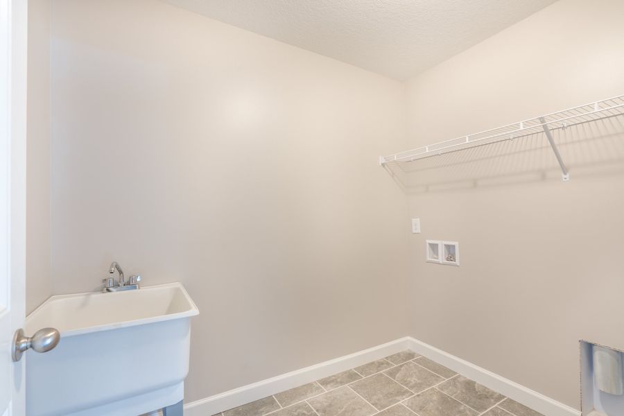 Representative unfurnished interior of a home built from the Sage by Enchanted Homes in Lonesome Dove, San Antonio (Image 18).