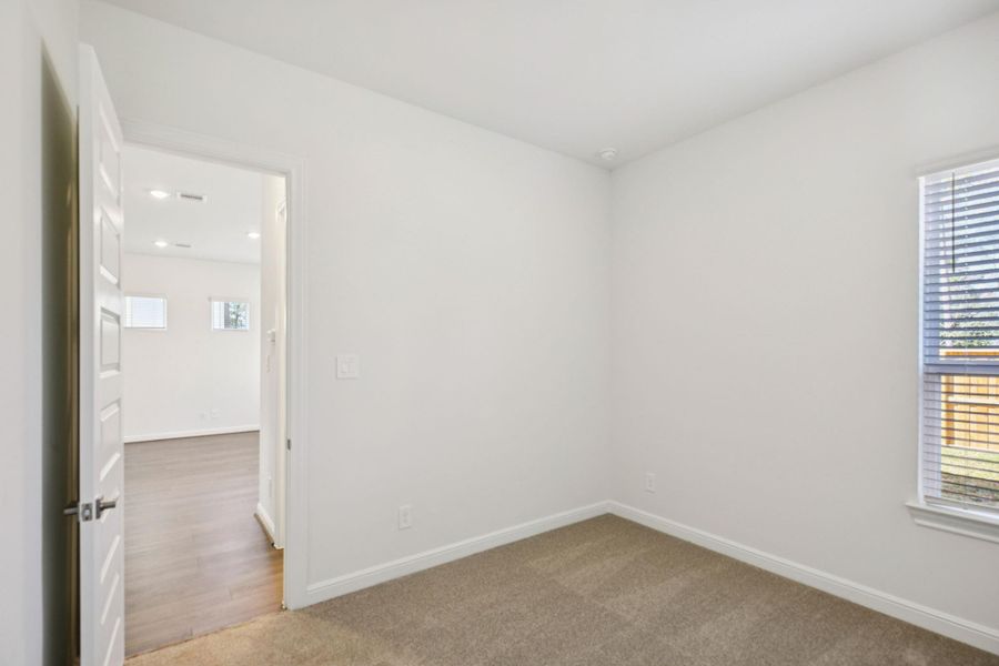 Spacious, unfurnished interior of a new home in Pinewood Trails - Luxe Series, Atascocita (Image 28).