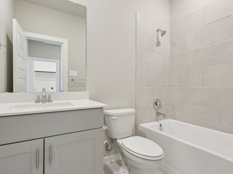 Furnished interior view inside a new home in Kemah Crossing - City Series, Kemah (Image 9).