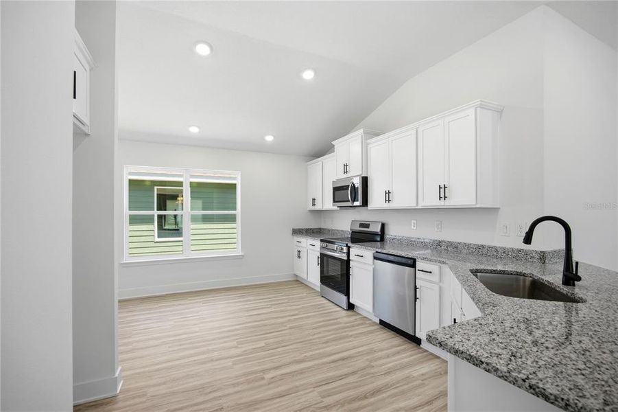 Furnished interior view inside a new home in Briarwood, Alachua (Image 9).