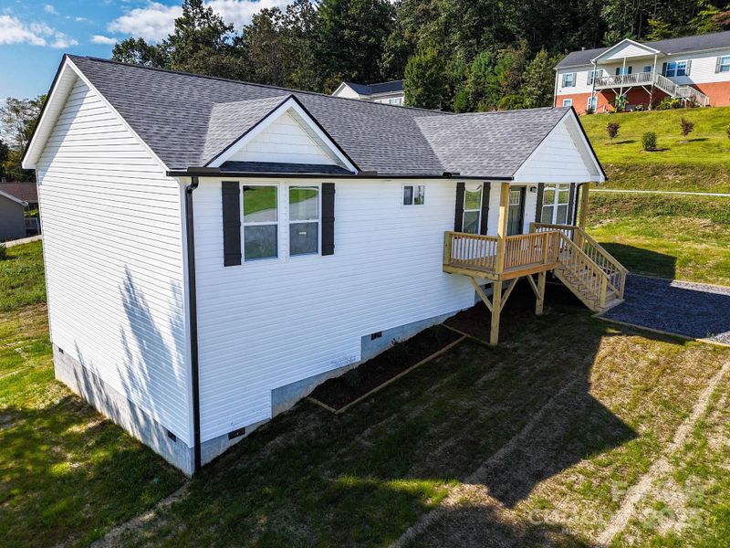 Front exterior of a new home in , Hendersonville, NC, highlighting curb appeal (Image 23).