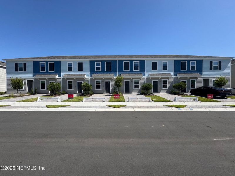 Front exterior of a new home in Sabal Terrace, Jacksonville, FL, highlighting curb appeal (Image 2).