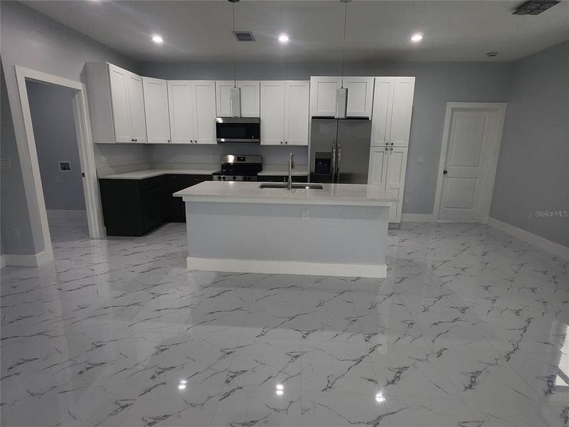 Furnished interior view inside a new home in , Port Charlotte (Image 8).