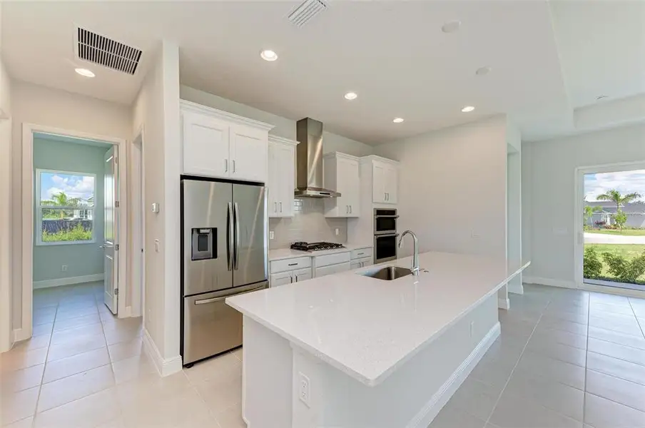 Furnished interior view inside a new home in The Willows, Parrish (Image 6).
