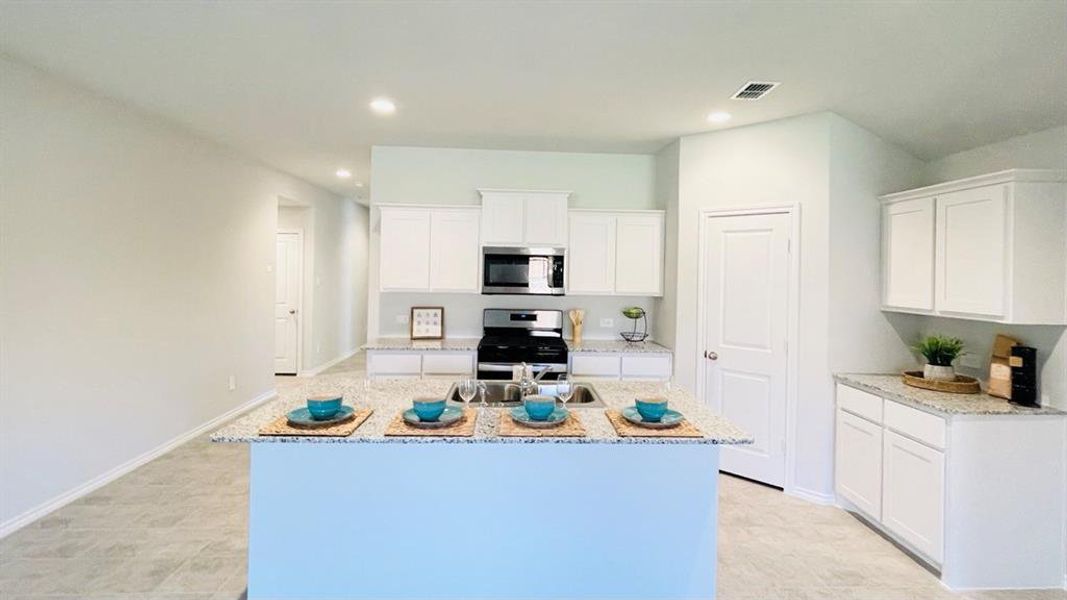 Kitchen - All Home and community information, including pricing, included features, terms, availability and amenities, are subject to change at any time without notice or obligation. All Drawings, pictures, photographs, video, square footages, floor plans, elevations, features, colors and sizes are approximate for illustration purposes only and will vary from the homes as built.