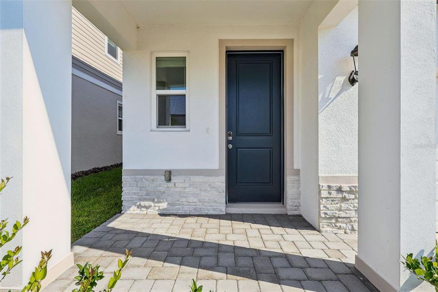 Exterior details and patio area of a home in Cyrene at Minneola - Villas, Minneola (Image 20).