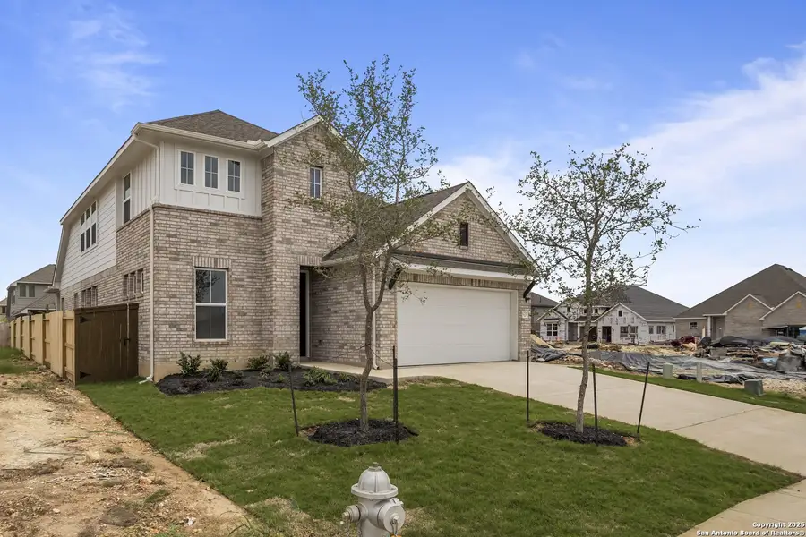 Front exterior of a new home in Stillwater Ranch, San Antonio, TX, highlighting curb appeal (Image 2).