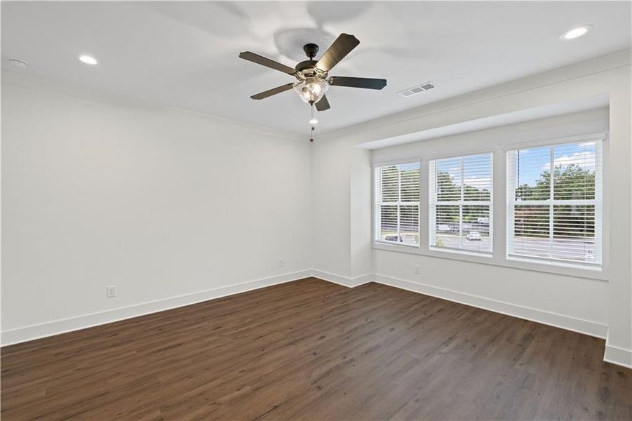 Spacious, unfurnished interior of a new home in Devin's Shire - A Kennesaw Tradition, Kennesaw (Image 35).