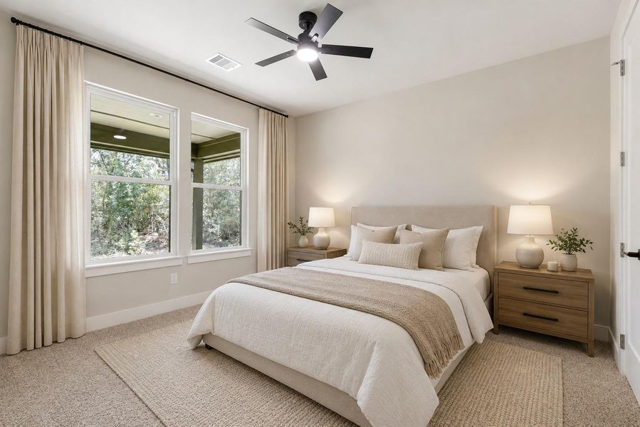 Secondary bedroom with views of the back yard.
