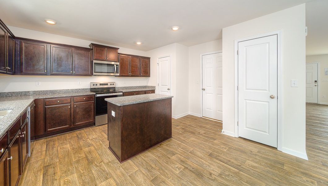 Representative furnished interior of a home built from the Harrison by D.R. Horton in Brookside Farms - The Meadows, Greer (Image 9).