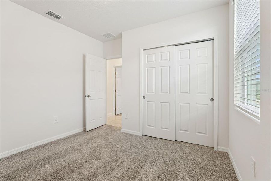 Spacious, unfurnished interior of a new home in Lawson Dunes - Signature Series, Haines City (Image 31).