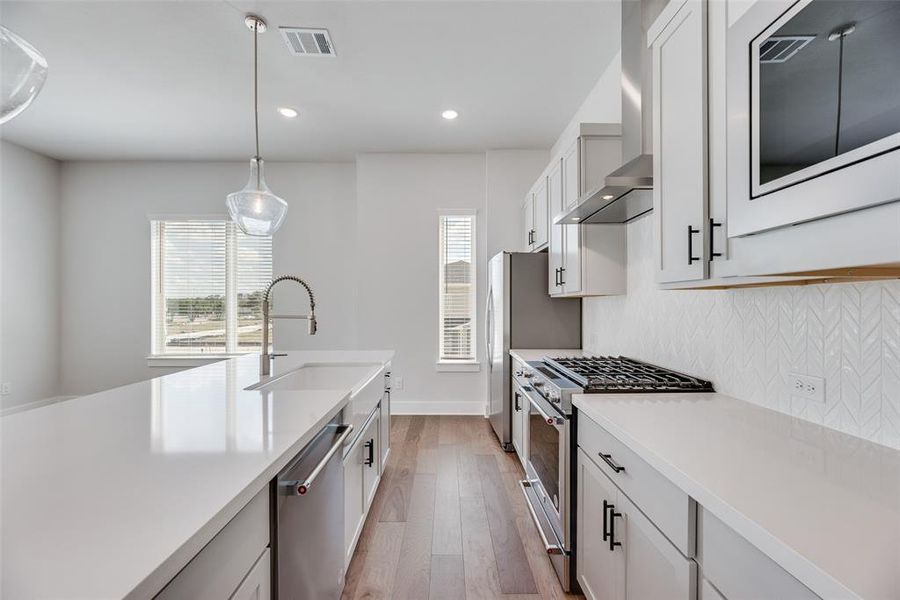 Furnished interior view inside a new home in Collin Creek, Plano (Image 8).