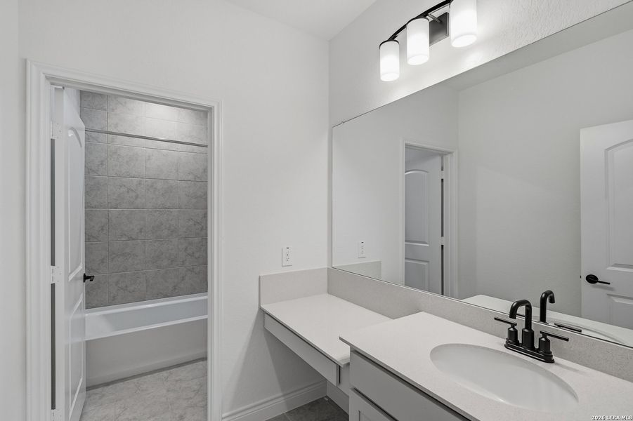 Furnished interior view inside a new home in Bison Ridge, San Antonio (Image 25).
