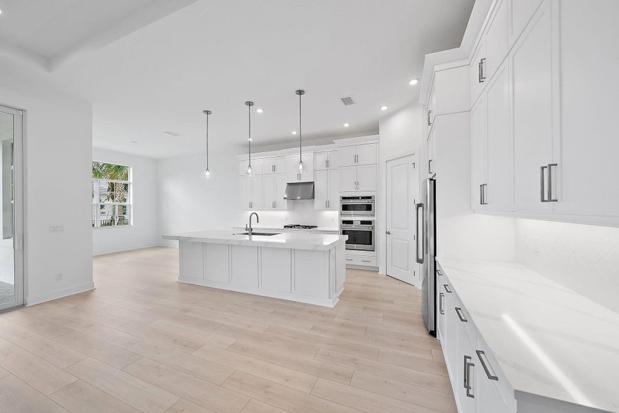 Furnished interior view inside a new home in L'Ambiance at Avenir, Palm Beach Gardens (Image 13).