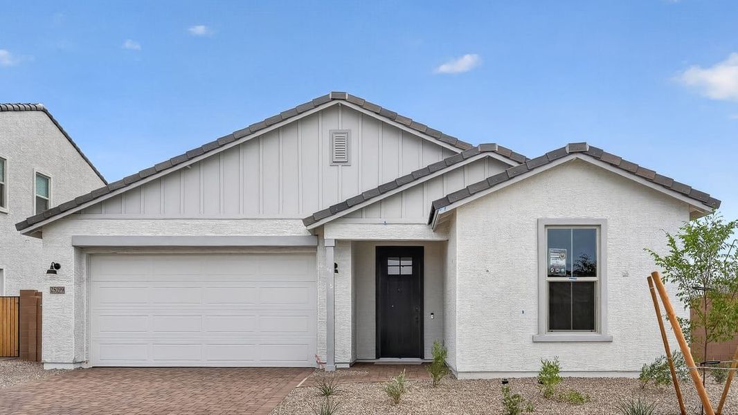 Representative exterior photo of a completed home built from the Origin by Taylor Morrison in Artisan at Asante, Surprise, AZ (Image 18).